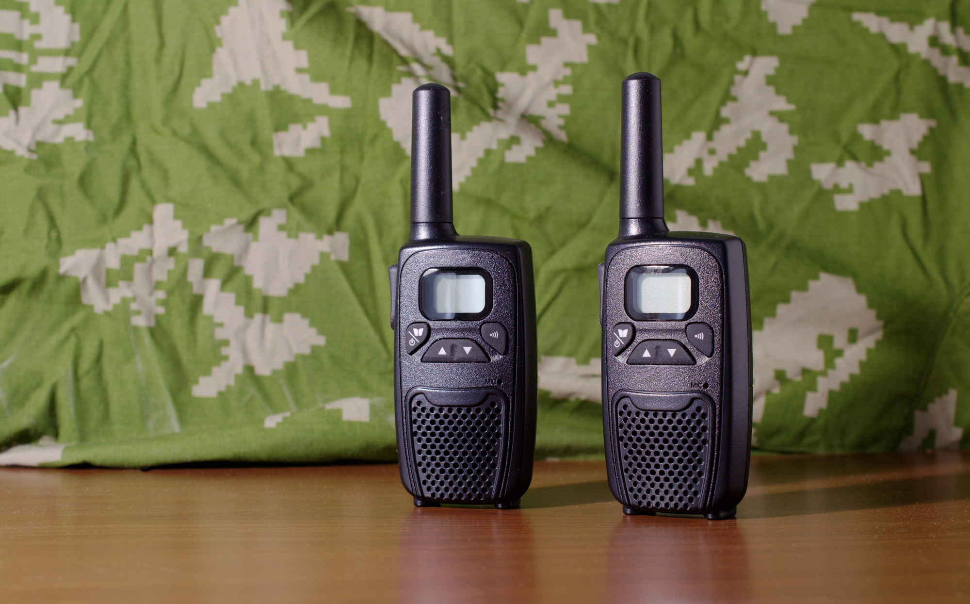 Radio communication device on green khaki background.